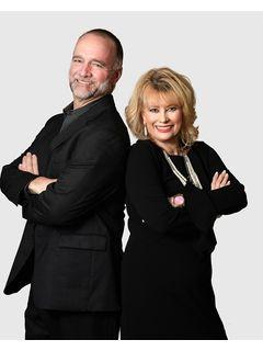 Sandy & Michael Bryan of CENTURY 21 Cota Realty photo