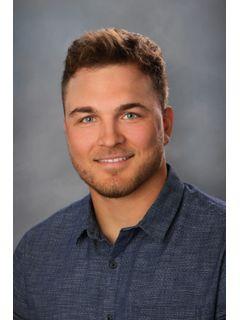 Austin Ramesh of CENTURY 21 Burkett & Associates photo