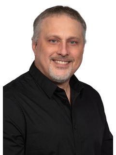 Troy Syverson of CENTURY 21 Price Right photo