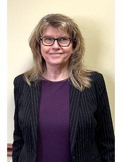 Sue Giroux of CENTURY 21 Broughton Team photo