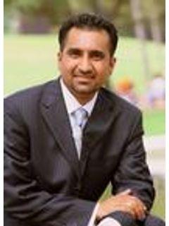 Minaz Abdulla of CENTURY 21 Olympian photo