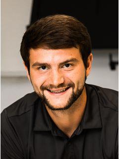 Dalton Arnold of CENTURY 21 Woodland Real Estate photo