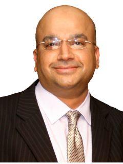 Sam Chaudhry of CENTURY 21 ENERGY photo
