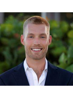 Adam Kutchmire of CENTURY 21 LIST with BEGGINS photo