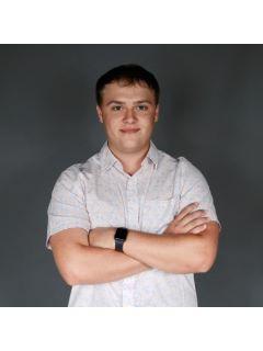 Gavin Kelm of CENTURY 21 Signature Real Estate photo